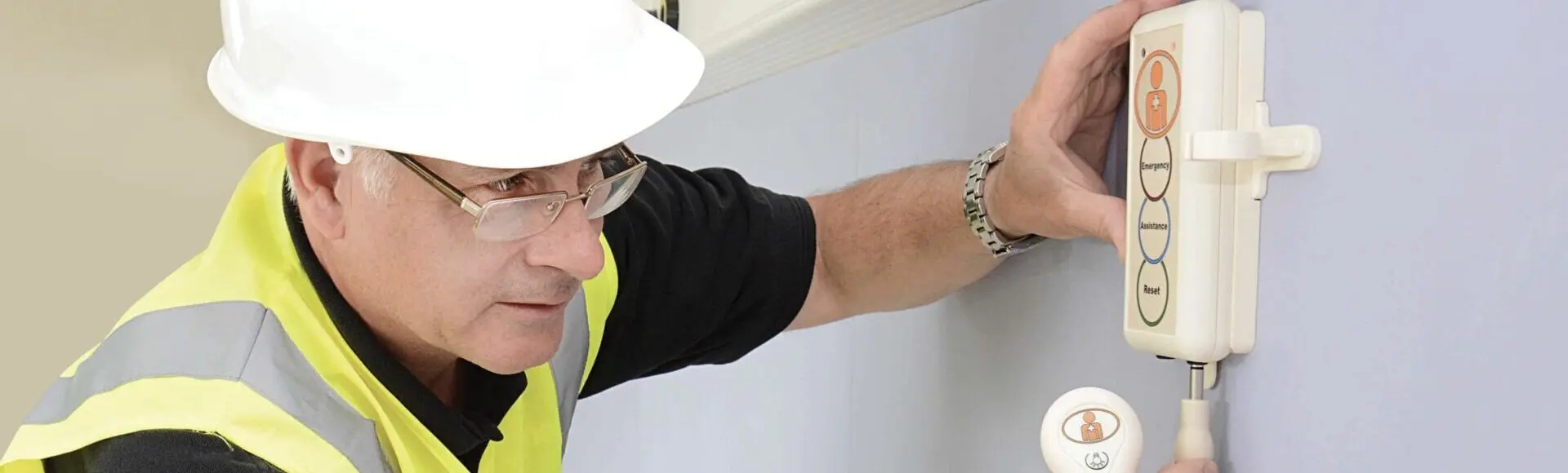 Courtney Thorne Technician installing a Nurse Call System