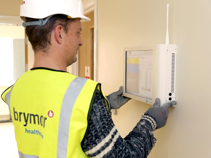 Courtney Thorne Technician installing a Nurse Call System