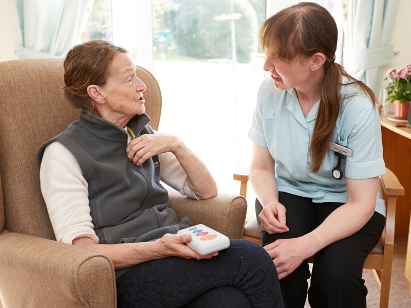 A care nurse and resident at the Montreux Living Care Home which uses a Courtney Thorne Nurse Call System