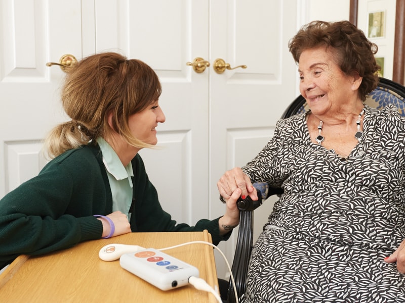 A care nurse and resident at the Montreux Living Care Home which uses a Courtney Thorne Nurse Call System